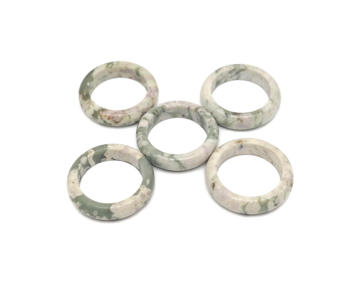 Peace Jade Crystal Ring by GemstoneGO featuring a polished jade crystal set in a sleek metal band.