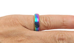Rainbow hematite crystal ring by GemstoneGO featuring a vibrant, multicolored hematite stone set in a sleek metal band.