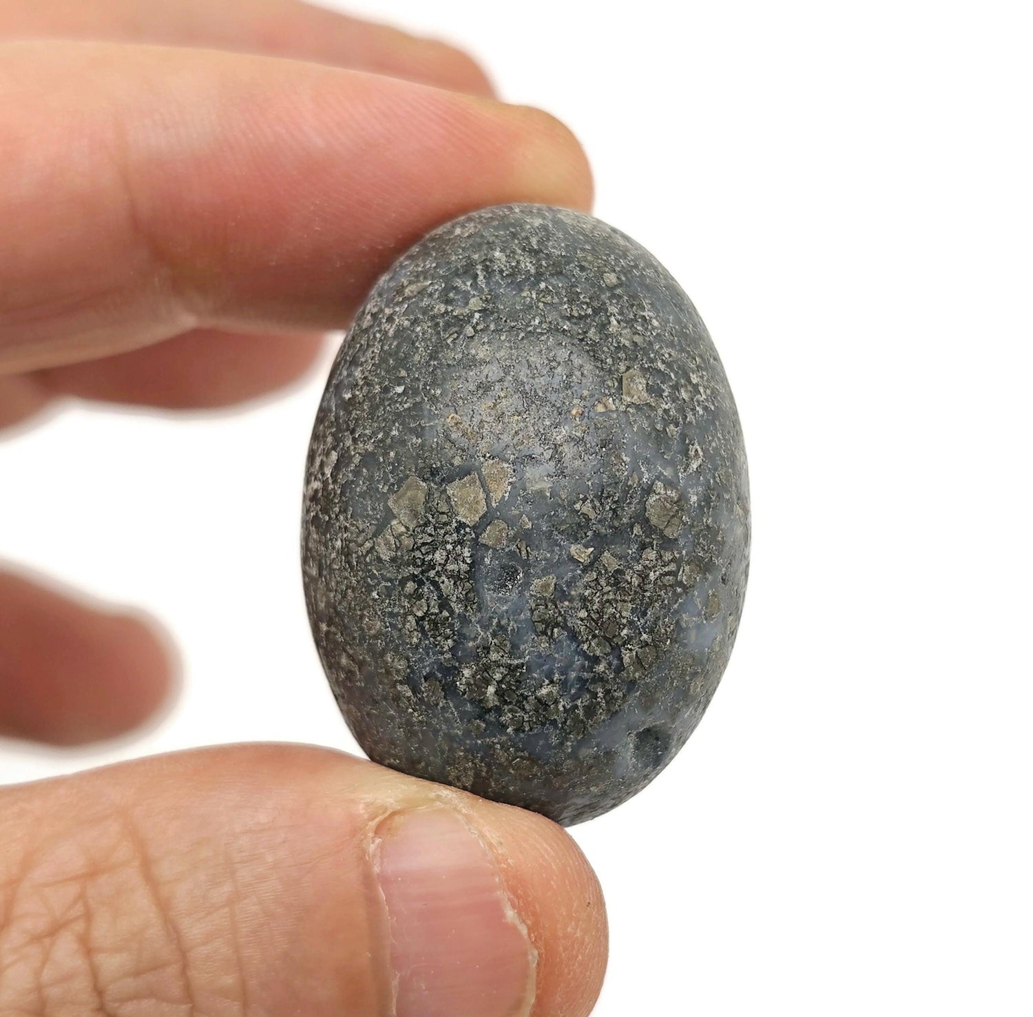 Close-up of a Cooper Agate tumbled stone from GemstoneGO, showcasing its smooth, colorful banded surface and polished finish.
