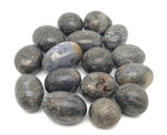 Cooper Agate tumbled stone from GemstoneGO showcasing warm brown and orange banded patterns on smooth polished surface.