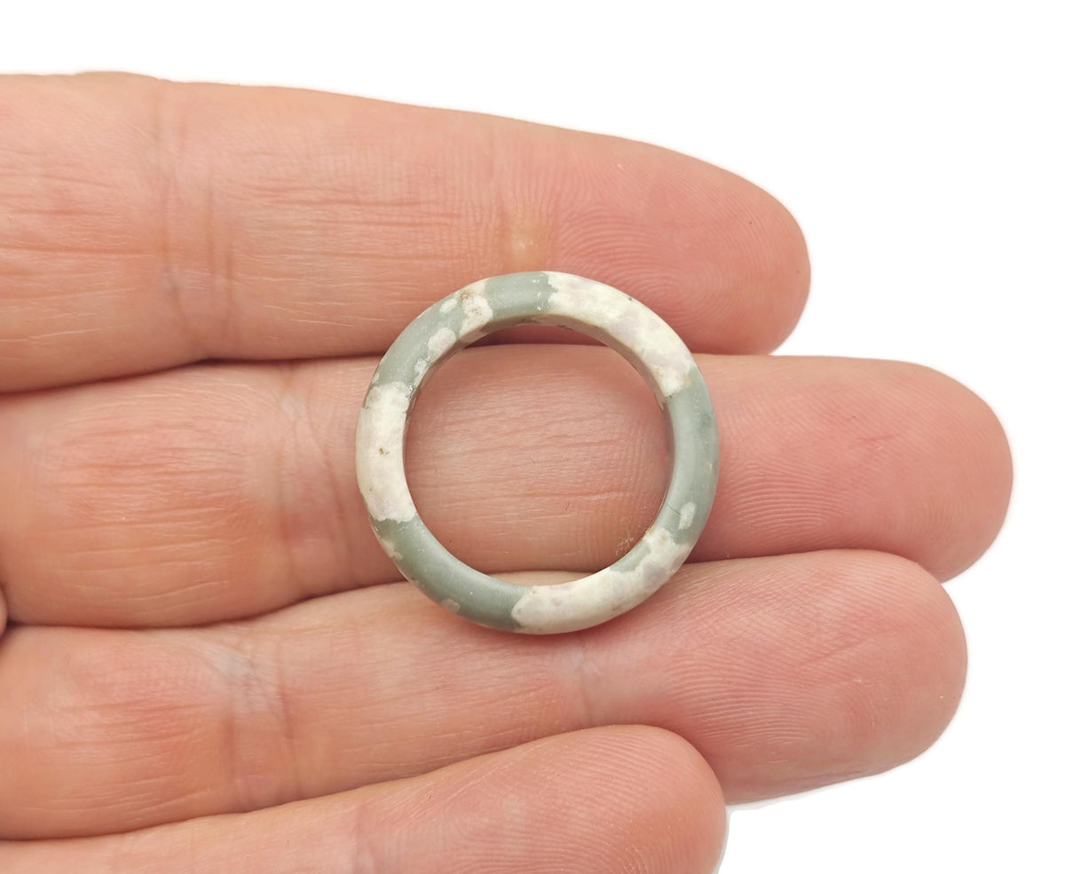 Peace Jade Crystal Ring by GemstoneGO featuring a smooth jade crystal set in a silver-toned band.