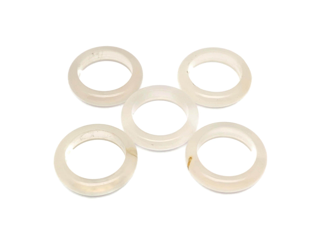 White Agate crystal ring by GemstoneGO featuring a polished white agate stone set in a sleek metal band.