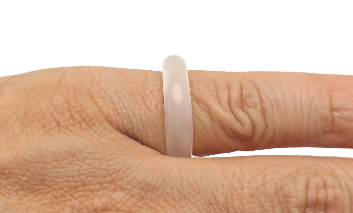 White agate crystal ring by GemstoneGO featuring a polished stone set in a sleek band, elegant jewelry for everyday or special occasions.