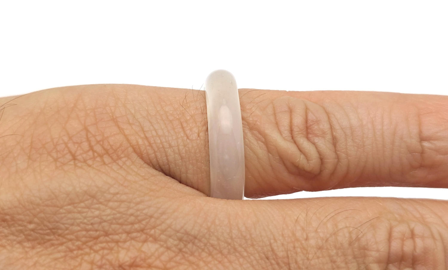 White agate crystal ring by GemstoneGO featuring a polished stone set in a sleek band, elegant jewelry for everyday or special occasions.