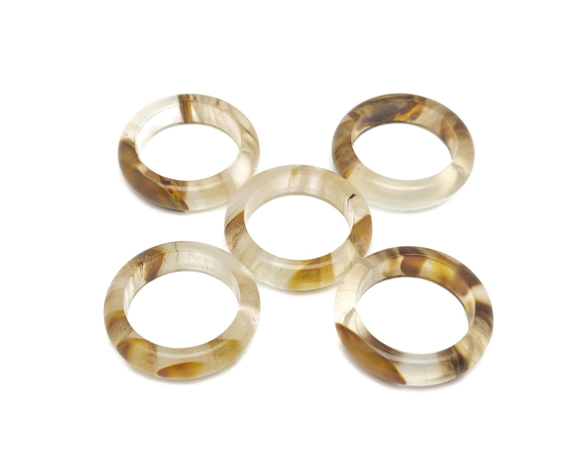 Yellow smelting quartz crystal ring by GemstoneGO featuring a vibrant yellow quartz centerpiece on a silver band.
