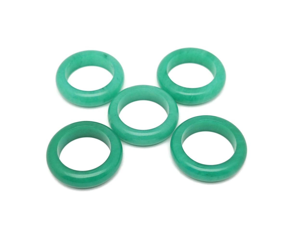 Green Jade Crystal Ring by GemstoneGO featuring a polished green jade gemstone set in a silver band.