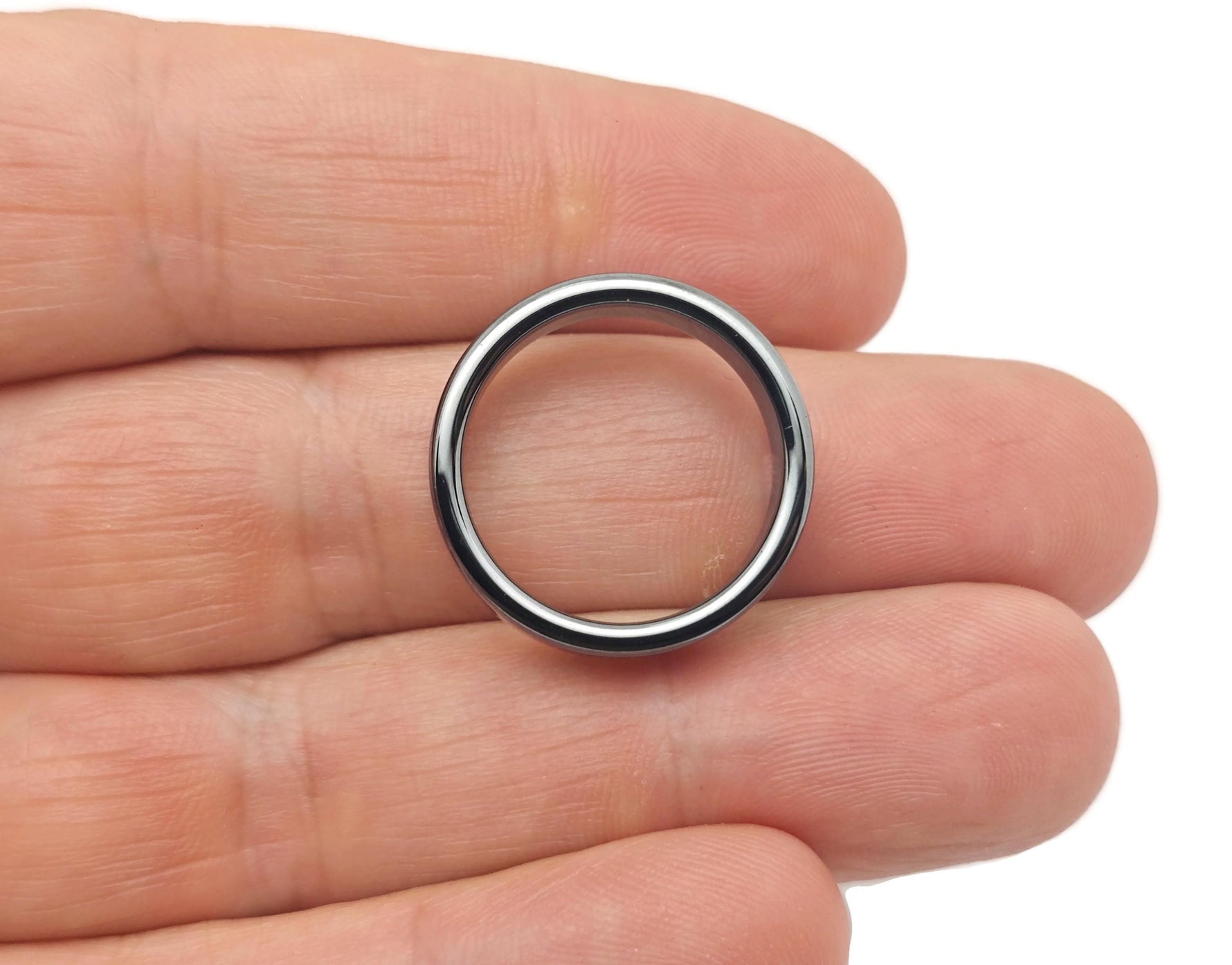 Hematite crystal ring by GemstoneGO featuring a smooth, polished hematite stone set in a sleek silver band.