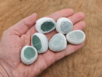 Aventurine seer tumbled river stone from GemstoneGO, smooth green gemstone with natural patterns and polished surface.