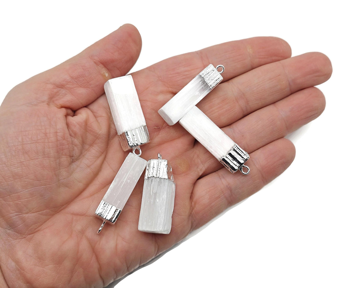 Selenite stick pendant from GemstoneGO, featuring a clear healing crystal pendant with a silver chain, natural and polished finish.