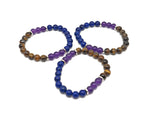 Handmade anxiety gemstone bracelet with colorful stones and adjustable cord, designed for calming and positive intentions.