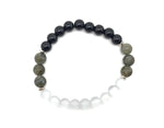 Handmade gemstone protection bracelet with colorful beads and adjustable cord, designed for positive intentions by GemstoneGO.
