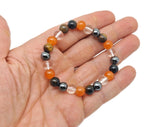 Handmade Confidence Gemstone Bracelet by GemstoneGO with colorful stones on an elastic band, designed for positive intention.
