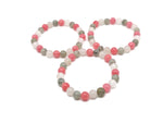 Handmade energy gemstone bracelet with colorful beads and adjustable cord, designed for positive intentions and spiritual wellness.