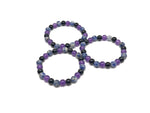 Handmade gemstone intention bracelet with smooth beads in calming colors, designed for soothing and positive energy.