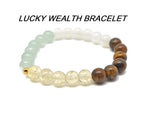 Handmade Lucky Wealth Gemstone Bracelet by GemstoneGO featuring colorful beads and intention-setting design.