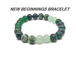 Handmade New Beginnings gemstone bracelet with colorful beads and silver accents, designed for intention and positivity.