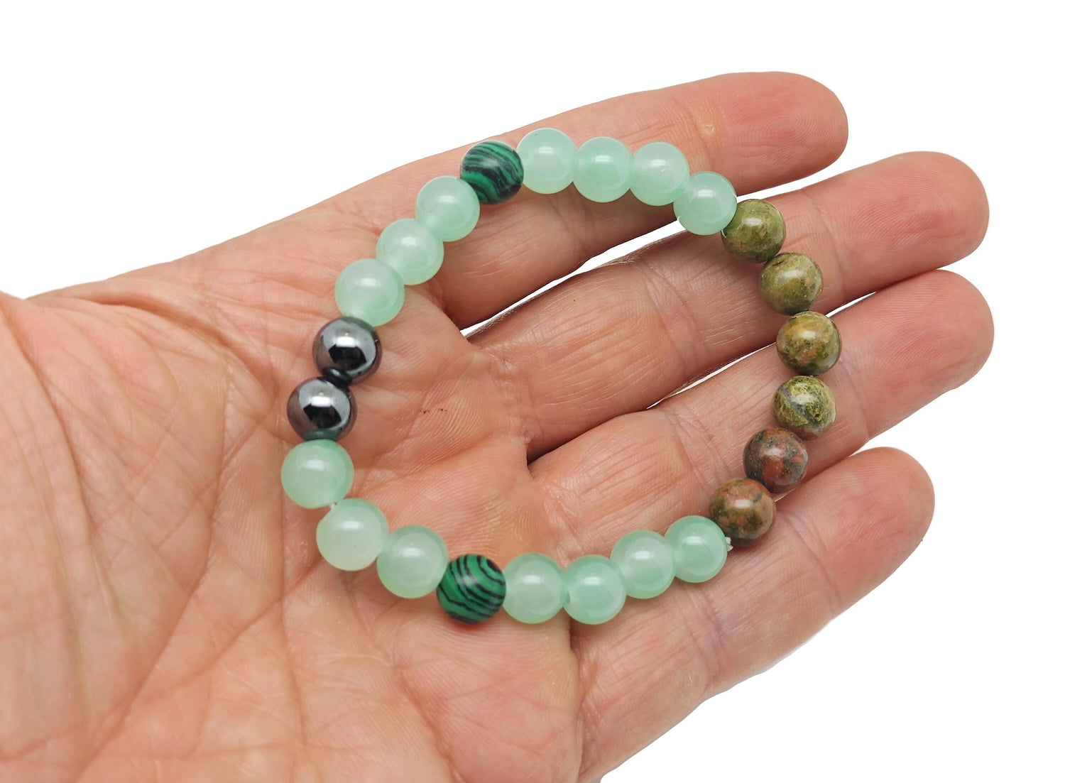 Handmade Promete gemstone bracelet by GemstoneGO featuring colorful stones on an elastic band, designed as an intention bracelet.