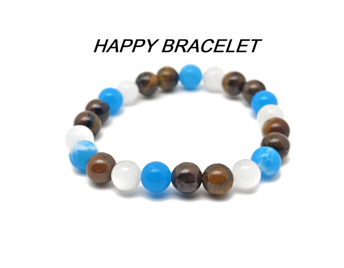 Handmade gemstone intention bracelet with colorful beads, featuring a central charm, designed by GemstoneGO.