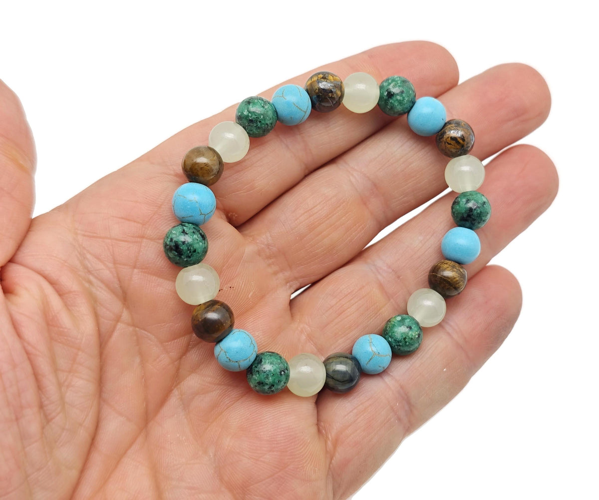 Handmade crystal healing gemstone bracelet with colorful beads, designed for positive intentions, by GemstoneGO.