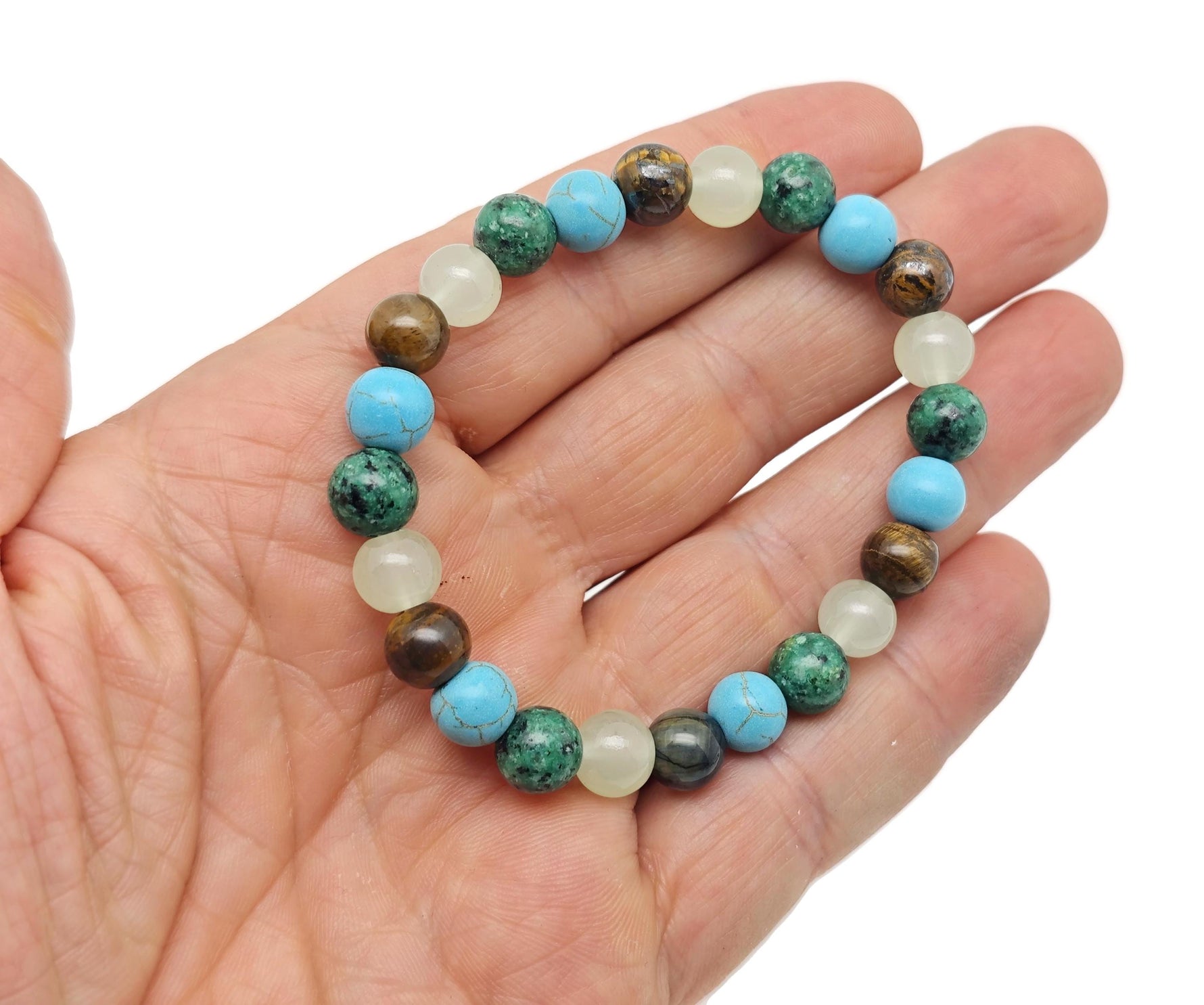 Handmade crystal healing gemstone bracelet with colorful beads, designed for positive intentions, by GemstoneGO.
