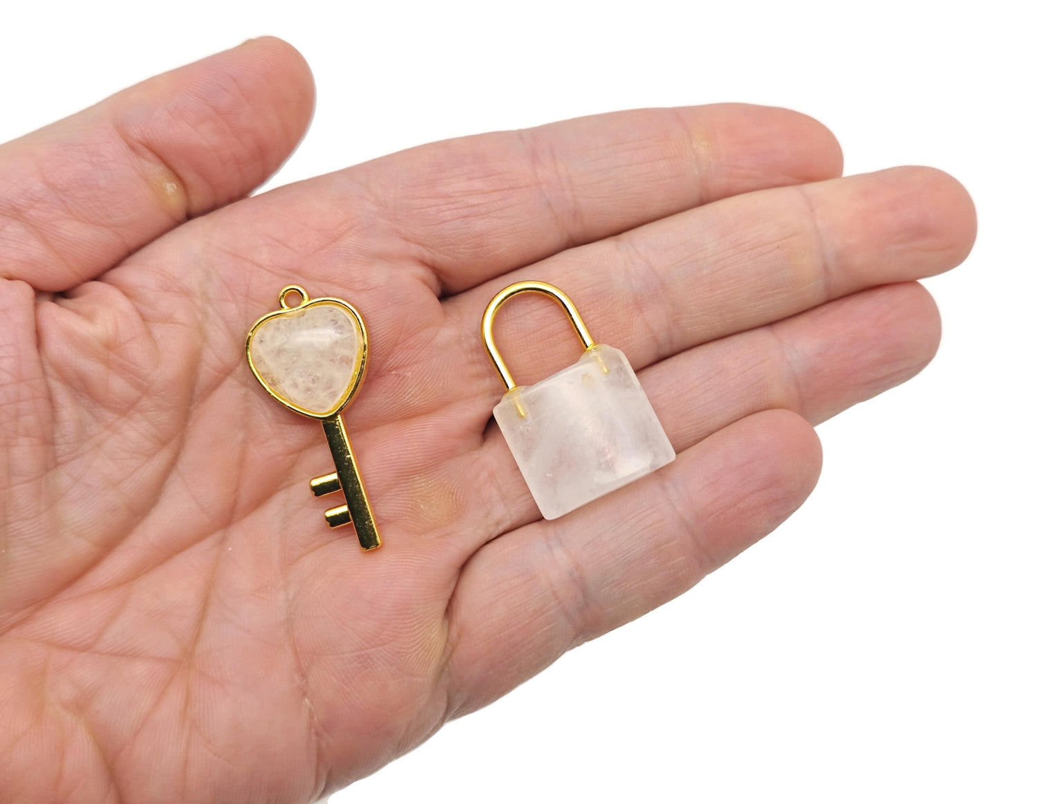 Clear quartz heart-shaped crystal pendant from GemstoneGO, featuring a polished heart-shaped clear quartz stone with a silver bail.