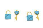Turquoise heart-shaped crystal pendant with key design from GemstoneGO, featuring a shiny silver chain and intricate details.