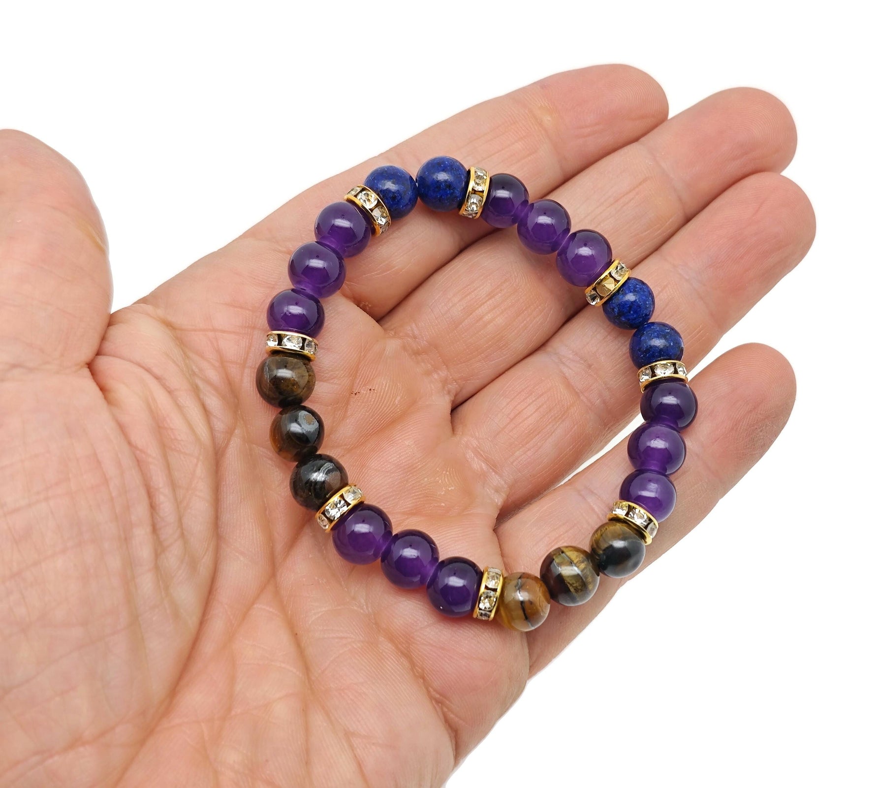 Handmade triple protection gemstone bracelet with colorful beads and charms, designed for intention and positive energy.