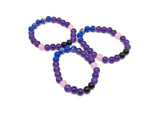 Handmade emf protection gemstone bracelet with colorful beads and adjustable cord, designed for positive energy and intention.