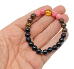 Handmade spooky gemstone bracelet with colorful stones, designed for intention and style by GemstoneGO.