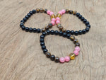 Handmade spooky gemstone bracelet with colorful stones and adjustable cord, designed for intention and stylish wear by GemstoneGO.