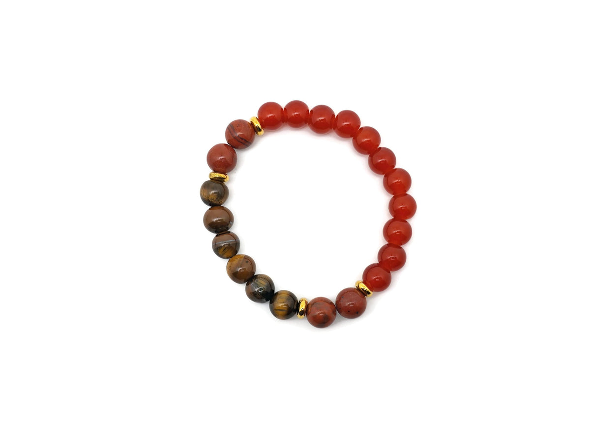Handmade gemstone stability bracelet featuring colorful beads and a natural stone charm, designed for intention and grounding.