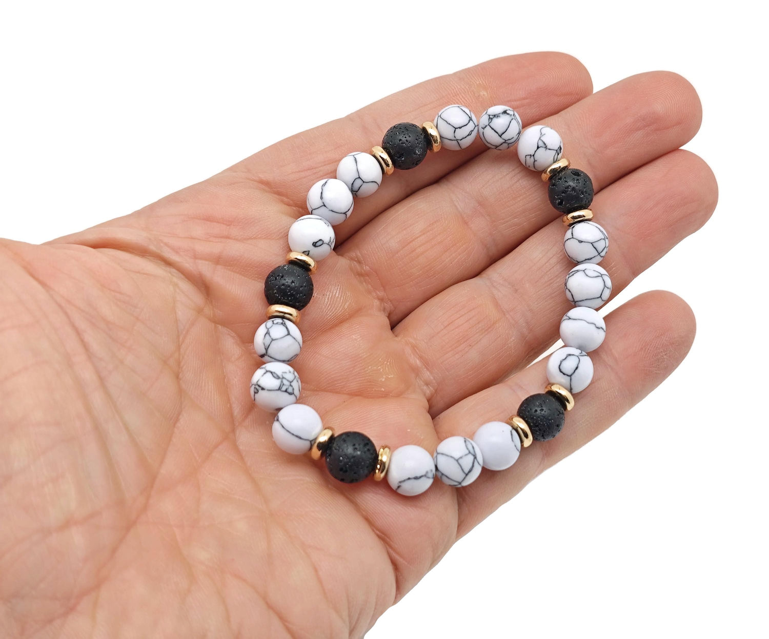 Handmade negative gemstone bracelet with colorful gemstones and silver accents, designed for positive intention and spiritual balance.