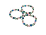 Handmade Wisdom Gemstone Bracelet with colorful stones and adjustable cord, designed for intention and spiritual growth.