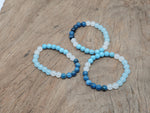 Handmade menopause gemstone bracelet with colorful beads, designed for intention and wellness by GemstoneGO.