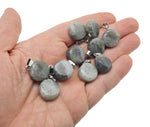 Flat round gemstone pendant featuring a crystal coin cabochon in various mixed colors, ideal for jewelry making.