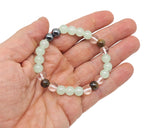 Handmade depression gemstone bracelet featuring colorful beads, designed for positive intentions and emotional well-being.