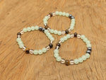Handmade depression gemstone bracelet with colorful beads and adjustable cord from GemstoneGO, designed for positive intentions.