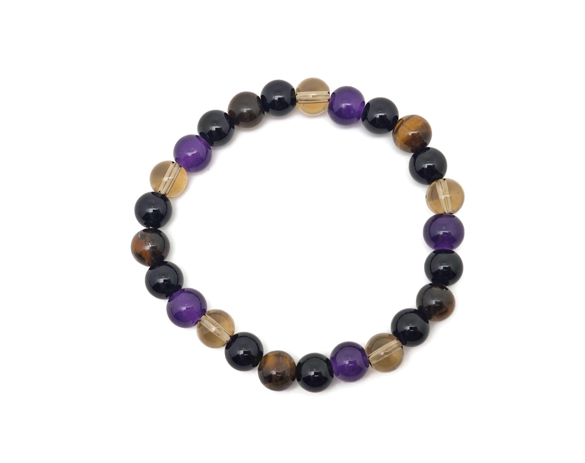 Handmade gemstone safety bracelet with colorful beads and adjustable cord, designed for positive energy and intention.
