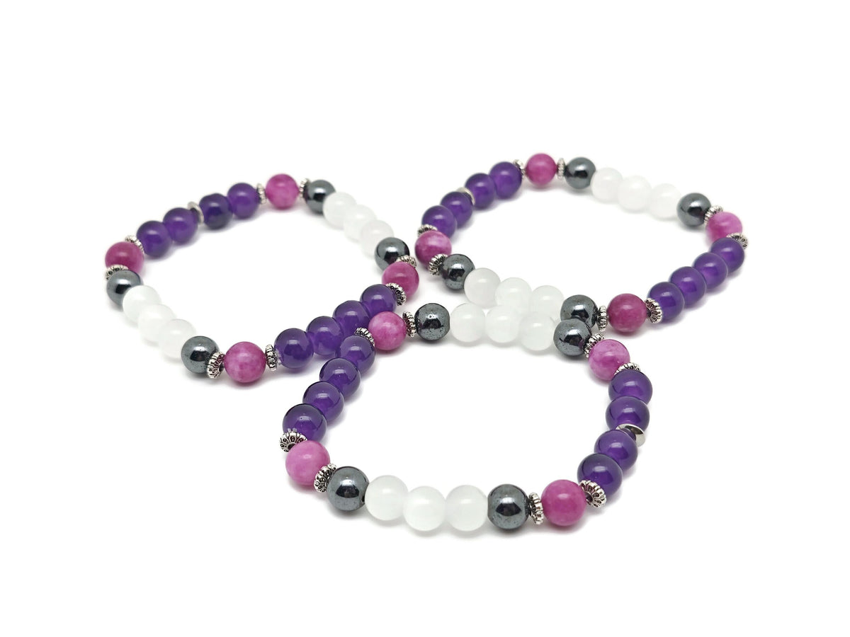 Handmade gemstone bracelet from GemstoneGO featuring colorful stones on a delicate cord, designed for sleep and positive intentions.