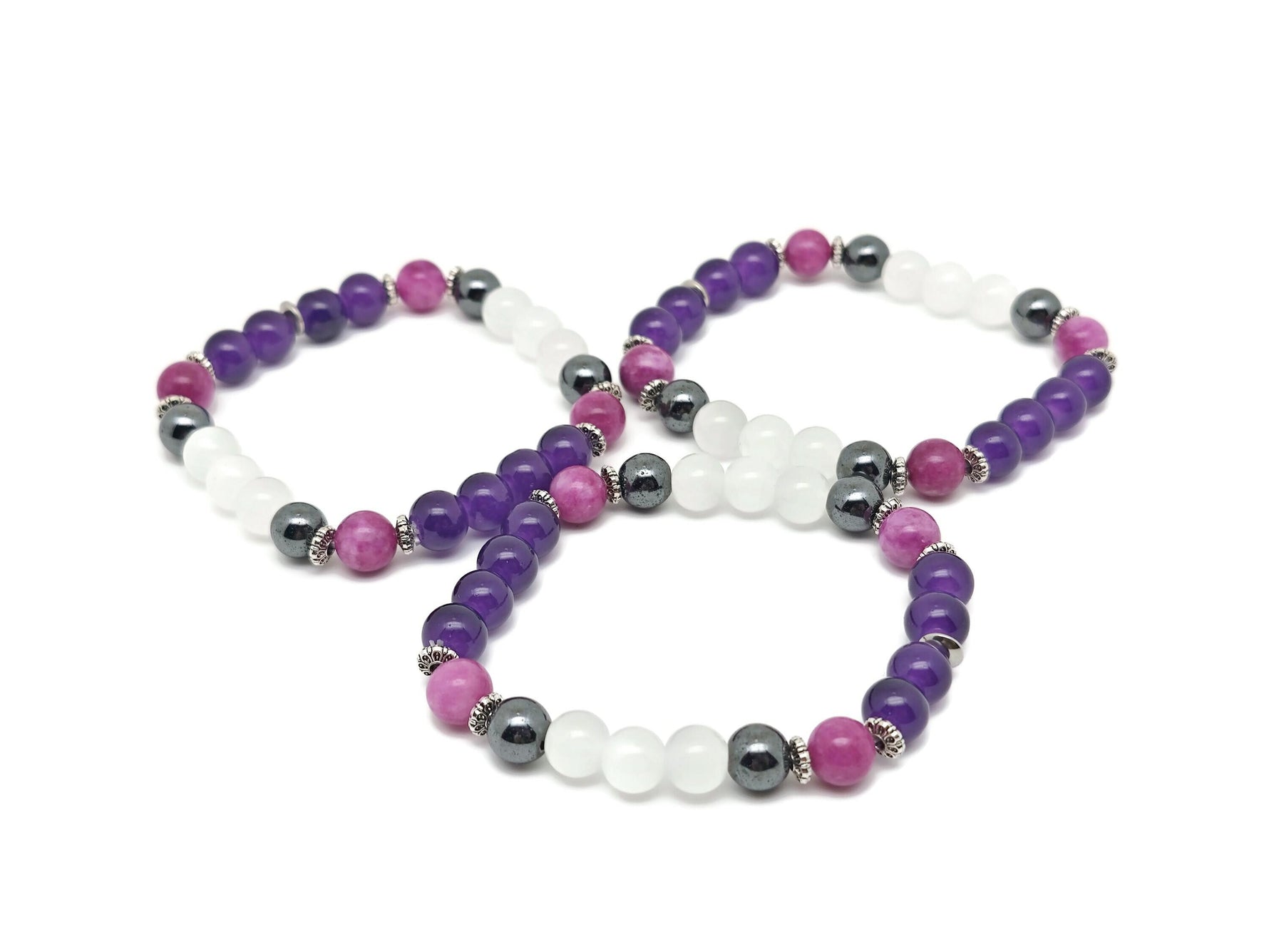 Handmade gemstone bracelet from GemstoneGO featuring colorful stones on a delicate cord, designed for sleep and positive intentions.