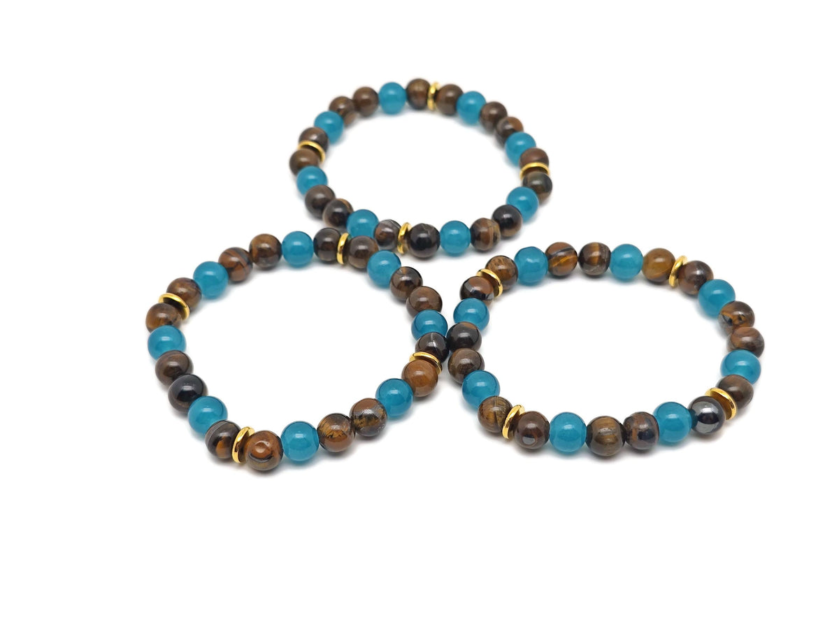Handmade Wealth Gemstone Bracelet by GemstoneGO featuring colorful gemstones on a stretch cord, designed for positive intentions.