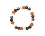 Handmade Confidence Gemstone Bracelet by GemstoneGO featuring colorful polished stones and adjustable cord for positive intention.