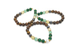 Handmade Wealthe gemstone bracelet with colorful beads and adjustable cord, designed for intention and style by GemstoneGO.