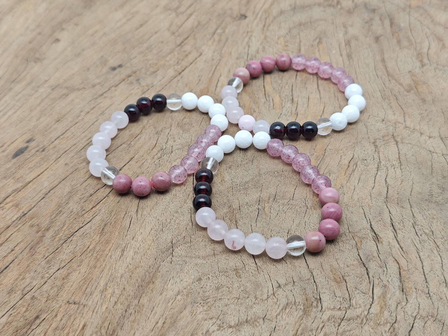 Handmade Love and Attract gemstone bracelet with colorful beads, intended for positive intention and attraction, by GemstoneGO.