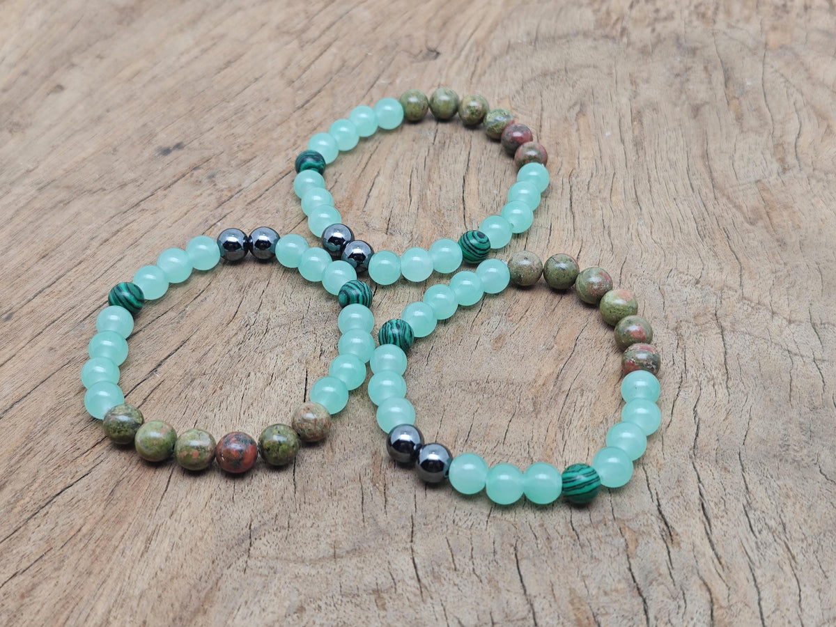 Handmade Promete gemstone bracelet with colorful beads and adjustable cord, designed for intention and spiritual wear.