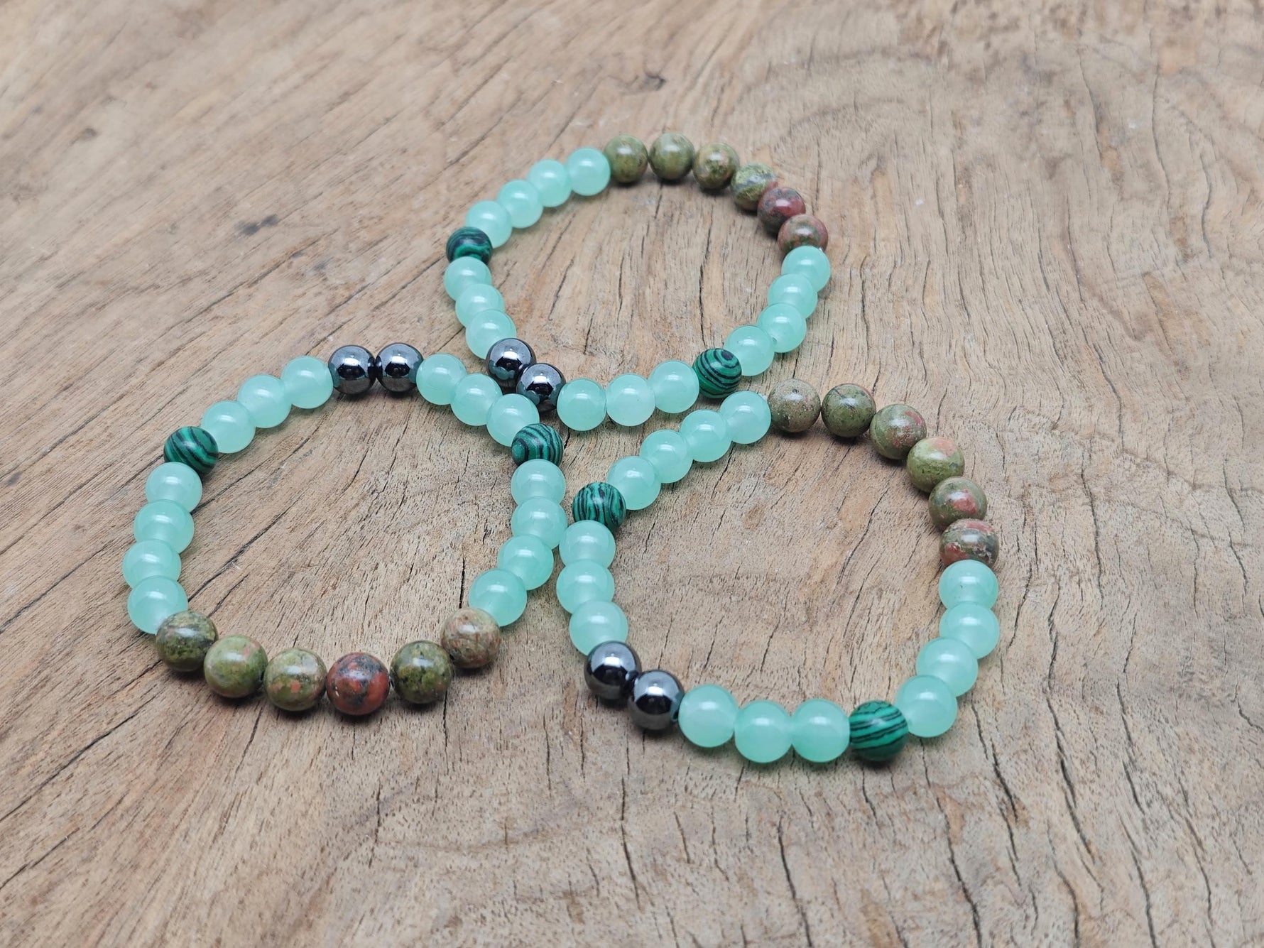 Handmade Promete gemstone bracelet with colorful beads and adjustable cord, designed for intention and spiritual wear.