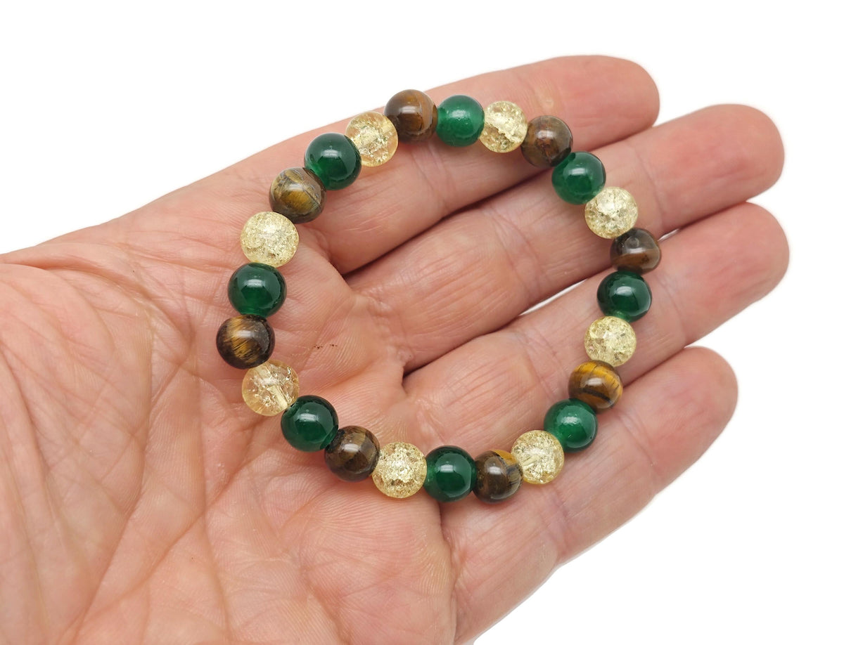 Handmade gemstone bracelet with colorful beads and silver accents, designed as an intention or self-esteem jewelry piece.