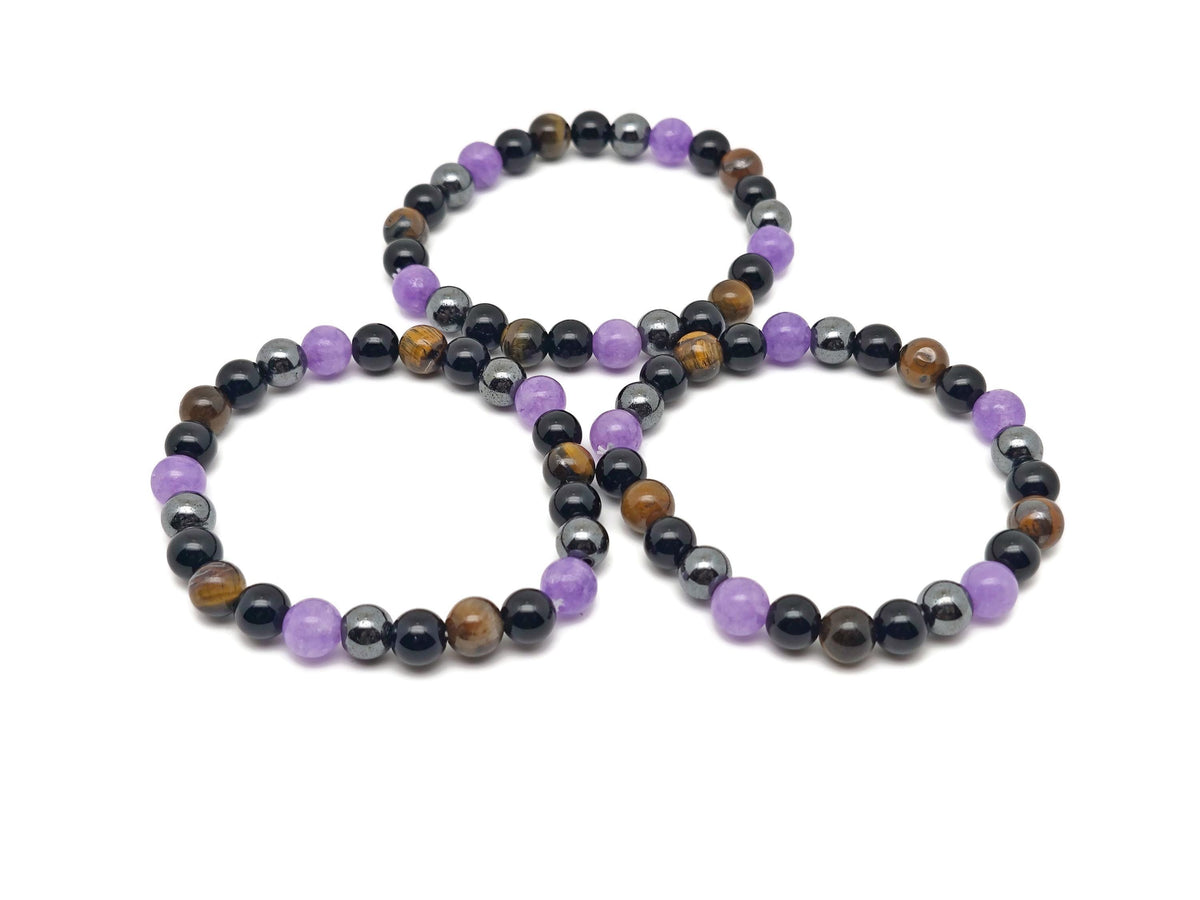 Handmade gemstone bracelet by GemstoneGO featuring colorful beads and an adjustable design, intended for positive intentions.