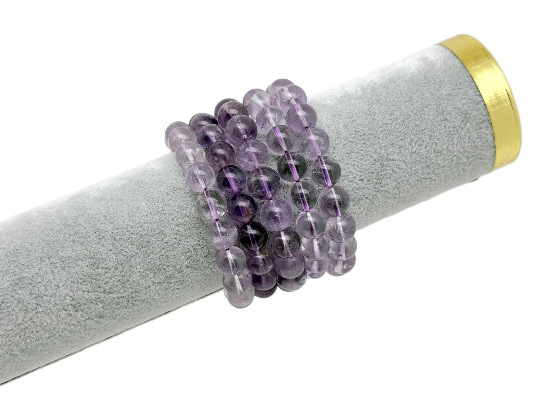 Amethyst beaded crystal bracelet for men and women with stretchy band, featuring polished purple stones for healing and style.