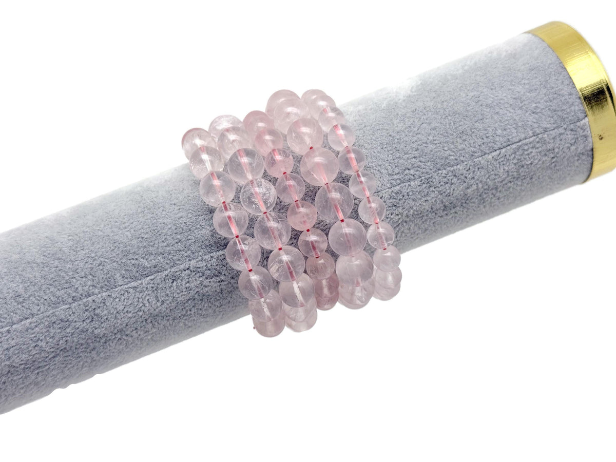 Rose quartz beaded crystal bracelet for men and women, stretchy jewelry with healing properties by GemstoneGO.